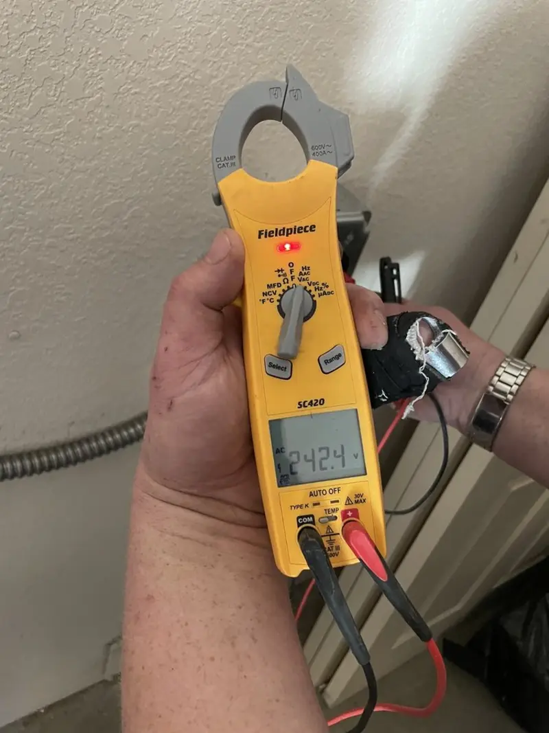 Voltage testing with clamp meter during Hot Tub / Pool Electrical Wiring in Delta
